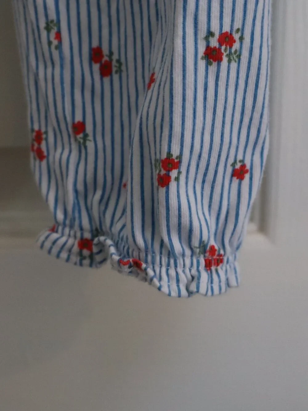 Carter's Jumper/Romper Blue stripes with red florals and ruffle sleeves Sz 18m